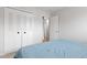 Bedroom featuring a large closet with white doors at 6426 Zang Ct, Arvada, CO 80004
