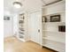 Basement featuring a door and shelving units at 4253 Hooker St, Denver, CO 80211