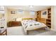 Cozy bedroom features carpet, built-in storage, and two windows providing natural light at 4253 Hooker St, Denver, CO 80211