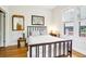 Cozy bedroom with wood floors, a large window, and side tables to add warmth at 4253 Hooker St, Denver, CO 80211