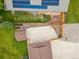 Aerial view of the backyard featuring a shed and fence, with a view of the roof of the house at 5954 W Leawood Dr, Littleton, CO 80123