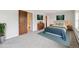 Bedroom featuring neutral colors, a large window, and a closet, virtually staged at 5954 W Leawood Dr, Littleton, CO 80123
