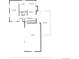 Main level floor plan showing the living room, kitchen, dining area, garage, and covered patio at 5954 W Leawood Dr, Littleton, CO 80123