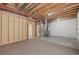 Unfinished basement featuring exposed ceiling with painted floor and insulated outer walls at 7859 S Coolidge Way, Aurora, CO 80016