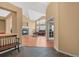 Inviting living room boasting a fireplace, hardwood floors, and an abundance of natural light at 7859 S Coolidge Way, Aurora, CO 80016