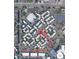 An aerial view shows the Woodstream Falls Condominiums with parking and a path leading to Sage at Panorama at 9725 E Harvard Ave # 305, Denver, CO 80231