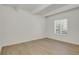 A bright bedroom featuring a large window and clean, minimalist decor at 9725 E Harvard Ave # 305, Denver, CO 80231