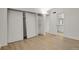 Features a closet with sliding doors and an open door to an adjacent bathroom at 9725 E Harvard Ave # 305, Denver, CO 80231