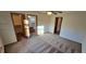 Spacious bedroom with access to bathroom and closet at 6567 Pierson St, Arvada, CO 80004