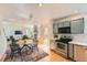 Open kitchen with stainless steel appliances, tile backsplash, and a view to the dining and living room at 744 Owl Dr, Louisville, CO 80027