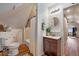 Bright bathroom featuring a shower and vanity, complemented by hardwood floors and a neutral color palette, for a cohesive design at 3233 W 29Th Ave, Denver, CO 80211