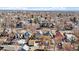 Aerial view showcasing a dense residential neighborhood with diverse homes and winter trees at 3233 W 29Th Ave, Denver, CO 80211