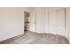 Bedroom features a closet and neutral carpet and paint at 3853 Orleans Ct, Denver, CO 80249