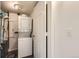 Stacked laundry machines in a closet/laundry area at 3853 Orleans Ct, Denver, CO 80249