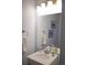 Stylish bathroom with a modern vanity and decorative accents at 7472 E 28Th Ave, Denver, CO 80238