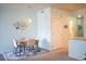 Bright dining area featuring a pendant light and decorative wall art at 7472 E 28Th Ave, Denver, CO 80238