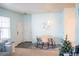 Open dining area with modern lighting fixture and stylish decor at 7472 E 28Th Ave, Denver, CO 80238