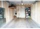 Spacious, unfinished garage with storage solutions and potential for customization at 7472 E 28Th Ave, Denver, CO 80238
