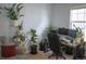 Bright home office space filled with natural light and adorned with lush greenery and plants at 7472 E 28Th Ave, Denver, CO 80238