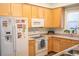 Functional kitchen with ample cabinet space and modern appliances at 7472 E 28Th Ave, Denver, CO 80238