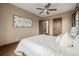 Bedroom with hardwood floors, ceiling fan, and a bright sunny vibe at 1138 E 14Th Ave # 12, Denver, CO 80218