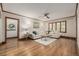 Well-lit living room features hardwood floors, comfortable seating, and stylish decor at 1138 E 14Th Ave # 12, Denver, CO 80218