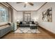 Well-appointed living room with hardwood floors, natural light, and contemporary decor at 1138 E 14Th Ave # 12, Denver, CO 80218