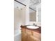 Bathroom featuring a shower, sink, and vanity at 4395 E Jewell Ave # 3, Denver, CO 80222