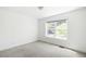 Neutral bedroom with natural light and a large window at 4395 E Jewell Ave # 3, Denver, CO 80222