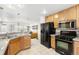 Well-equipped kitchen with modern black appliances and ample cabinet space at 4395 E Jewell Ave # 3, Denver, CO 80222