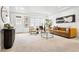 Spacious living room with comfortable seating and plenty of natural light at 4395 E Jewell Ave # 3, Denver, CO 80222