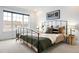 Inviting bedroom with a large window and comfortable modern furnishings at 4395 E Jewell Ave # 3, Denver, CO 80222