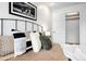 Bedroom featuring a neatly made bed with soft pillows and a large closet at 4395 E Jewell Ave # 3, Denver, CO 80222