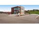 The community center features contemporary architecture with large windows and inviting spaces, enhancing community engagement at 3578 Tranquility Trl, Castle Rock, CO 80109