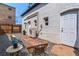 Cozy backyard area with outdoor seating and a white painted brick building at 20 1/2 S Sherman St, Denver, CO 80209