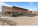 Commercial building with a brick facade featuring the Punch Bowl Social business and adjacent parking at 20 1/2 S Sherman St, Denver, CO 80209