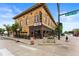 Corner building featuring exposed brick exterior, large windows, and signage for Hornero restaurant at 20 1/2 S Sherman St, Denver, CO 80209