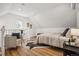 Inviting main bedroom features stylish decor, wood floors, and ample natural light at 20 1/2 S Sherman St, Denver, CO 80209