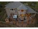 Aerial view of the home with a deck, hot tub, and outdoor seating at 4125 Aspen Ln, Evergreen, CO 80439