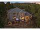 Aerial view of the property showcasing the backyard, hot tub, and deck at 4125 Aspen Ln, Evergreen, CO 80439