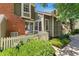 Charming townhouse with a well-kept front yard and a white picket fence at 2013 S Helena St # B, Aurora, CO 80013