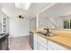 Bright kitchen features stainless steel appliances, light countertops, and a double sink at 2013 S Helena St # B, Aurora, CO 80013