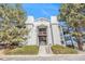 Exterior of charming multi-Gathering home with balconies and professionally landscaped front yard at 17493 E Mansfield Ave # 1231L, Aurora, CO 80013