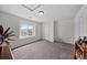 Bonus room with carpet and a window overlooking mountain views at 3074 Castle Butte Dr, Castle Rock, CO 80109