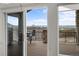Relaxing outdoor deck with patio furniture and beautiful mountain views at 3074 Castle Butte Dr, Castle Rock, CO 80109