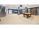 Finished basement with pool table, staircase, carpet flooring, and home theatre at 6987 Esperanza Dr, Castle Pines, CO 80108