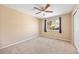 Bedroom with neutral paint, carpet and a window for natural lighting at 6987 Esperanza Dr, Castle Pines, CO 80108