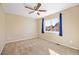 Bedroom with tan carpet, neutral paint and a window with curtains at 6987 Esperanza Dr, Castle Pines, CO 80108
