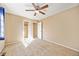 An inviting bedroom with carpet, neutral paint and closet at 6987 Esperanza Dr, Castle Pines, CO 80108