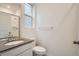 Well-maintained bathroom showcasing modern fixtures and a shower with glass door at 7199 Waterleaf Trl, Littleton, CO 80125